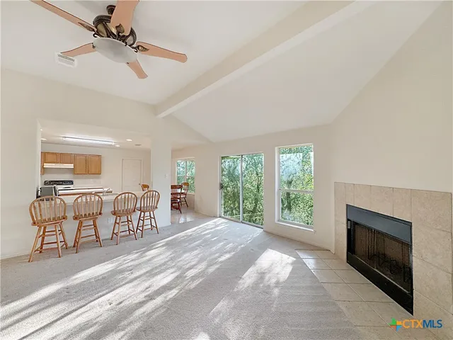 a view of a livingroom with furniture window and outside view