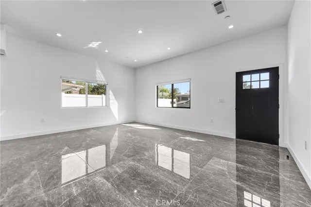 a view of a livingroom with a window