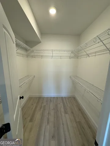 a view of a room with racks on the wall