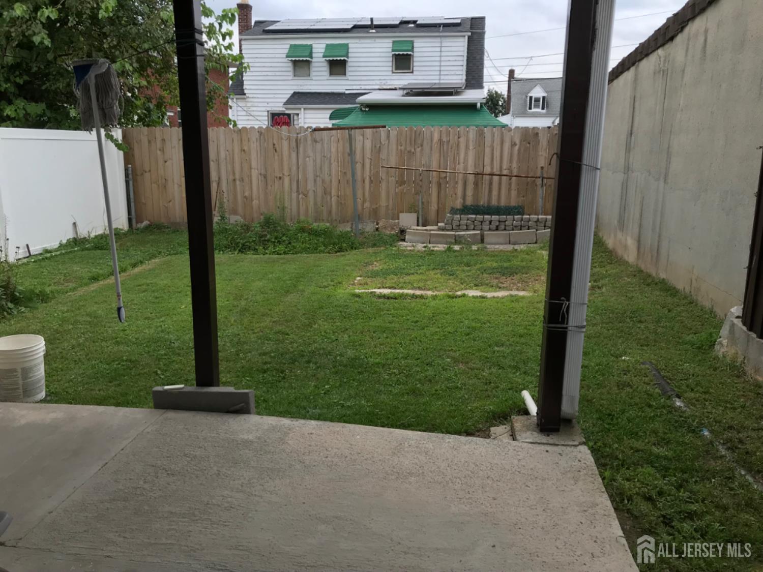 689 Mary Street Perth Amboy, NJ 08861 - Photo 16 of 24 a view of a back yard of the house