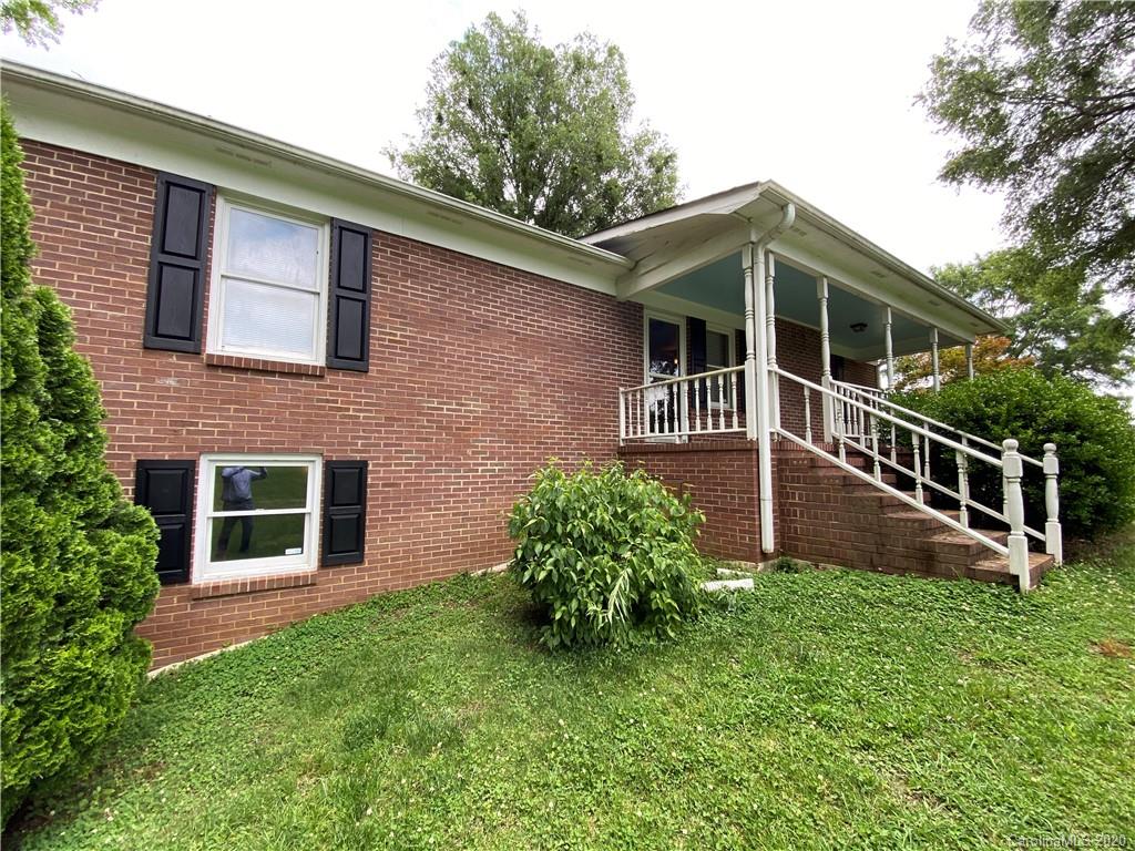 3301 Back Creek Church Road Charlotte, NC 28213 - Photo 2 of 30 a front view of a house with garden