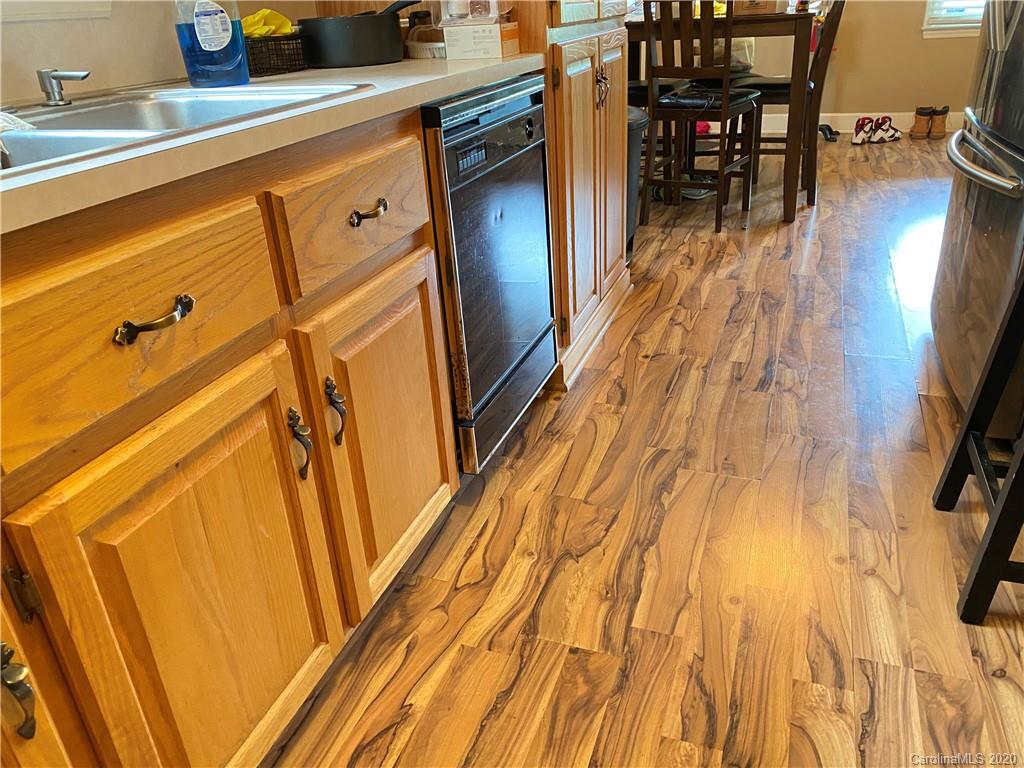 3301 Back Creek Church Road Charlotte, NC 28213 - Photo 11 of 30 a view of a patio with wooden floor