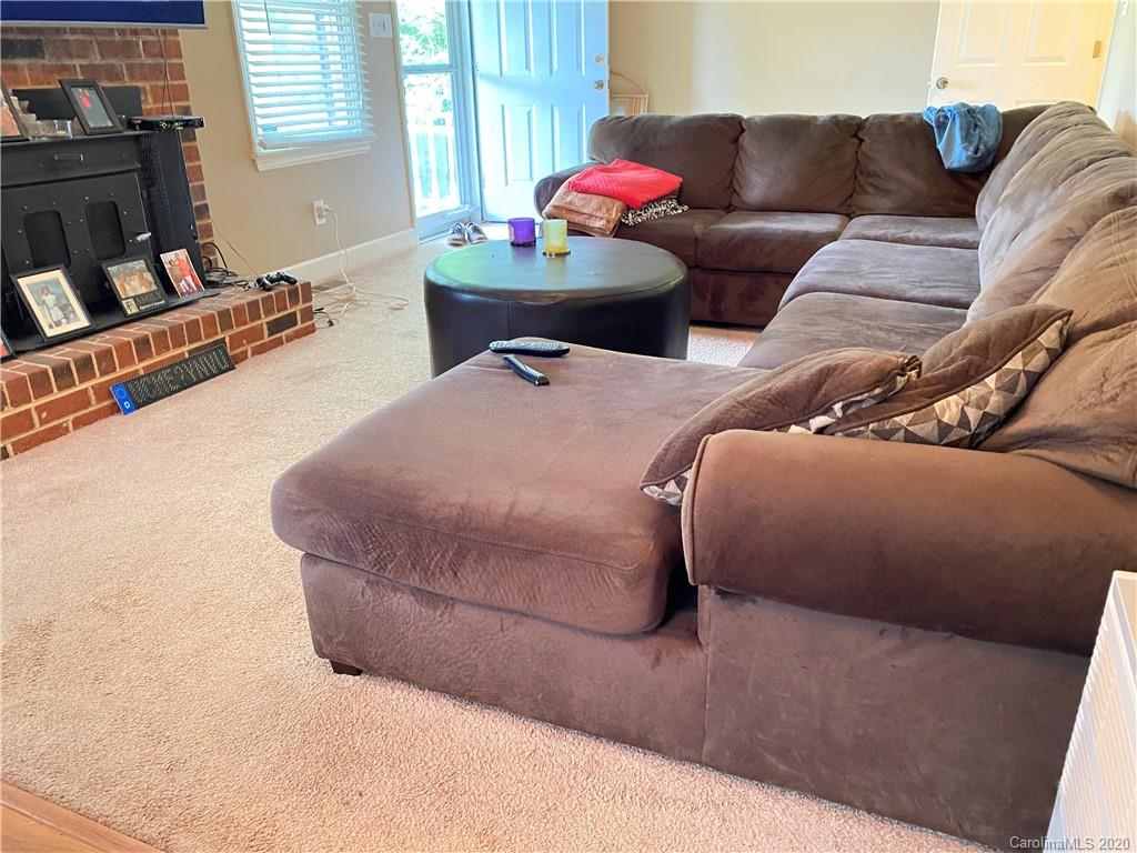 3301 Back Creek Church Road Charlotte, NC 28213 - Photo 12 of 30 a living room with furniture and a flat screen tv