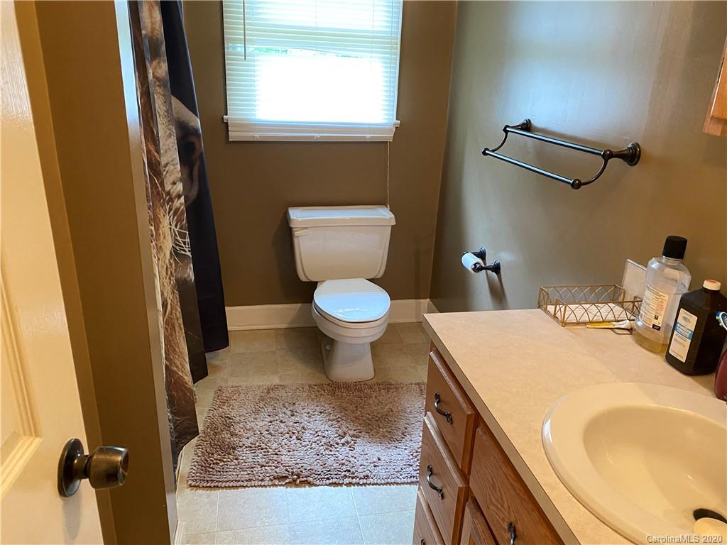 3301 Back Creek Church Road Charlotte, NC 28213 - Photo 19 of 30 a bathroom with a sink toilet and shower