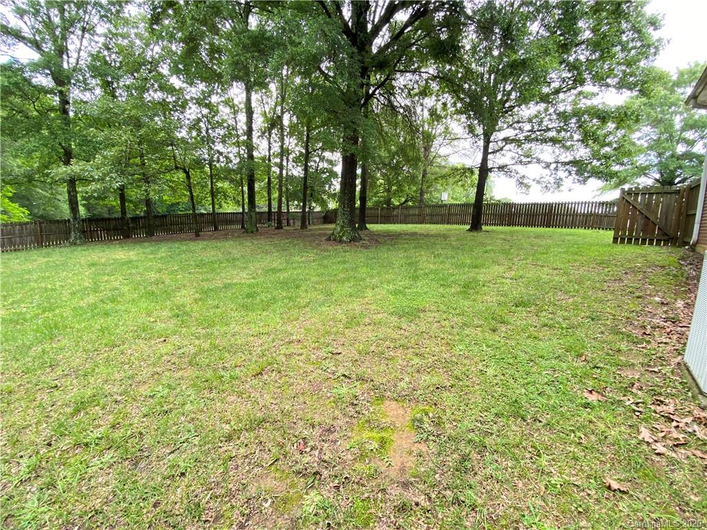 3301 Back Creek Church Road Charlotte, NC 28213 - Photo 23 of 30 a view of outdoor space with deck and yard