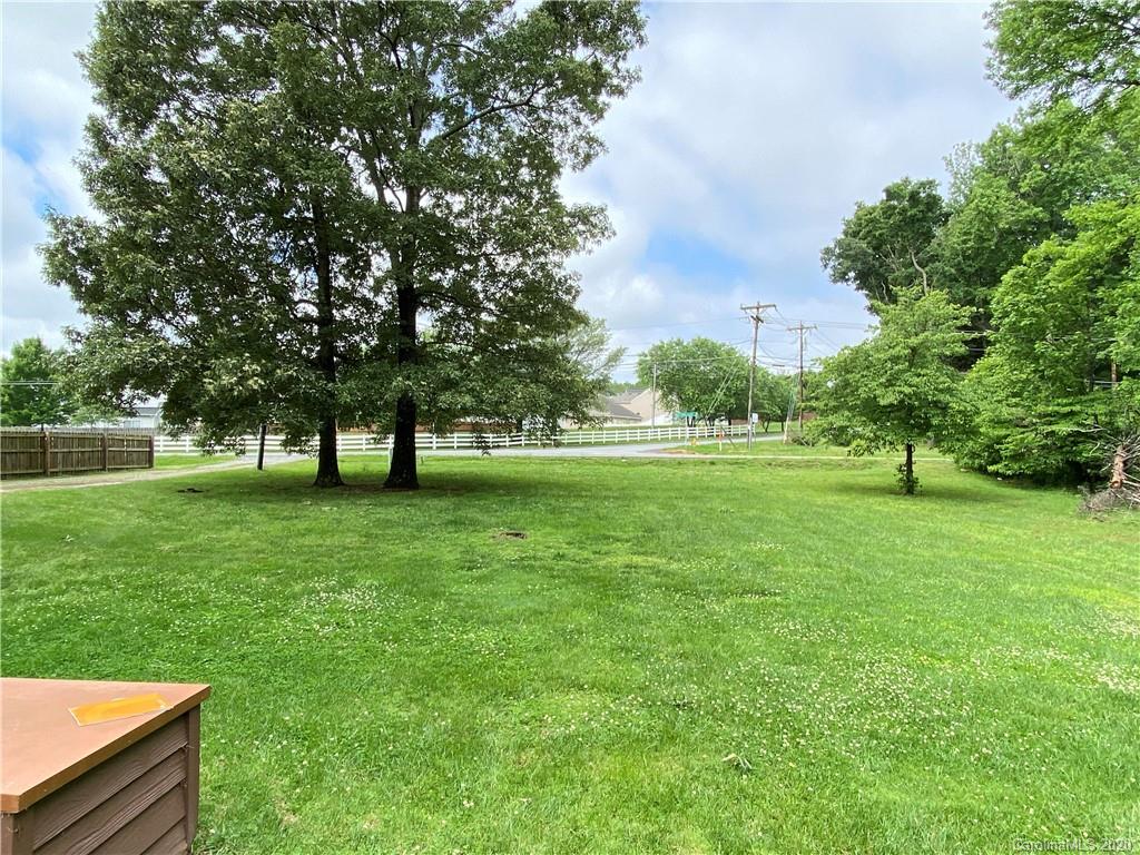 3301 Back Creek Church Road Charlotte, NC 28213 - Photo 26 of 30 a view of green field with trees in the background