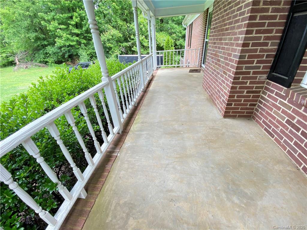 3301 Back Creek Church Road Charlotte, NC 28213 - Photo 4 of 30 a view of a balcony with wooden floor