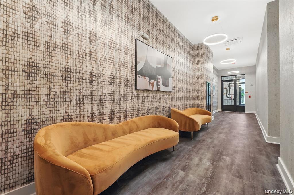 199 East Post Road, Unit 202 White Plains, NY 10601 - Photo 10 of 21 a bathroom with a blue tub
