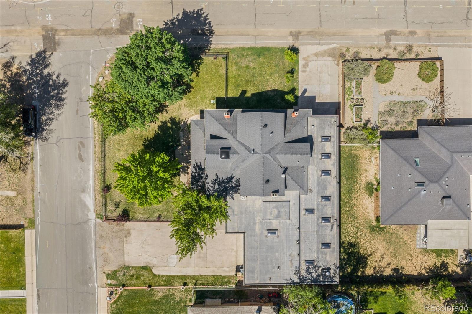 6595 West 46th Place Wheat Ridge, CO 80033 - Photo 45 of 48 an aerial view of a house with a garden