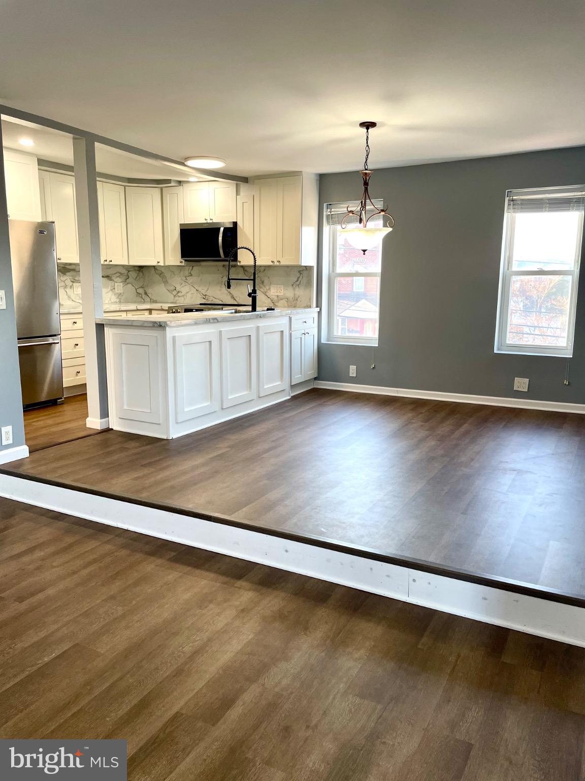 326 Walnut Street Spring City, PA 19475 - Photo 8 of 18 Spacious open-concept living area with light.