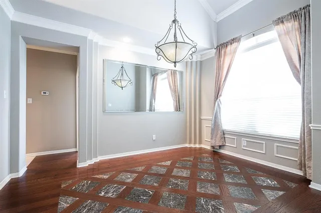 a view of a room with a large window