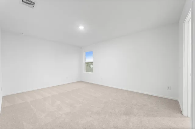 an empty room with a natural light