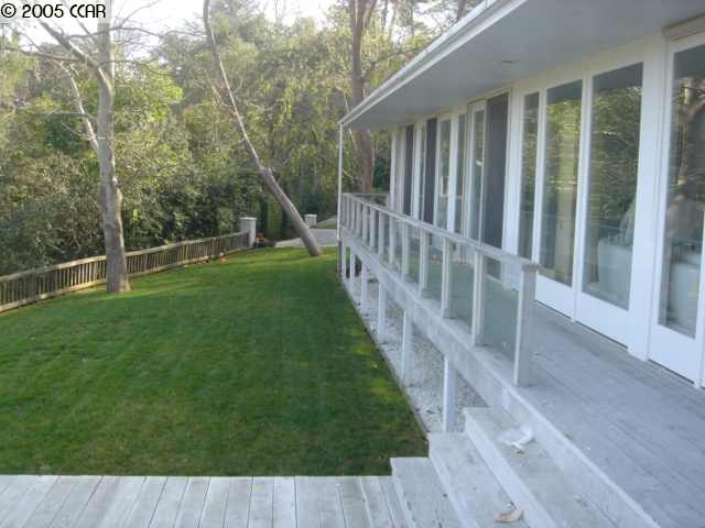 3976 Canyon Road Lafayette, CA 94549 - Photo 1 of 1 a view of deck with backyard and floor to ceiling window
