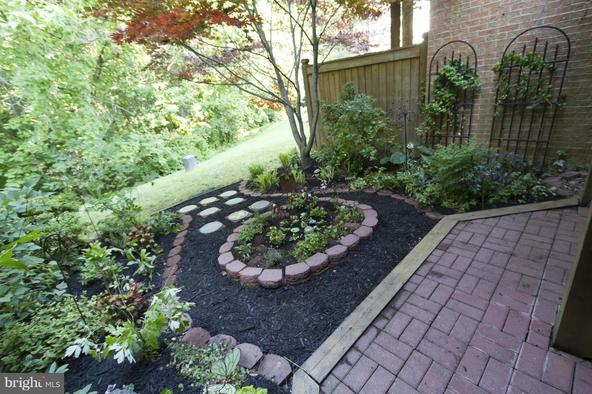 1245 Wild Hawthorn Way Reston, VA 20194 - Photo 22 of 22 Patio over Looking Trees
