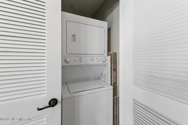 a bathroom with a toilet sink and shower