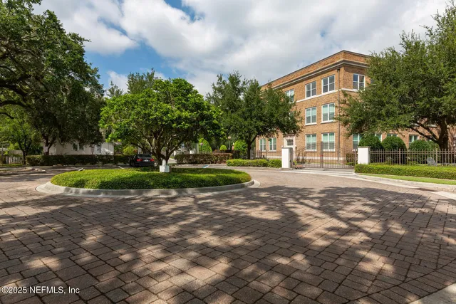 a view of a table and chairs in the garden