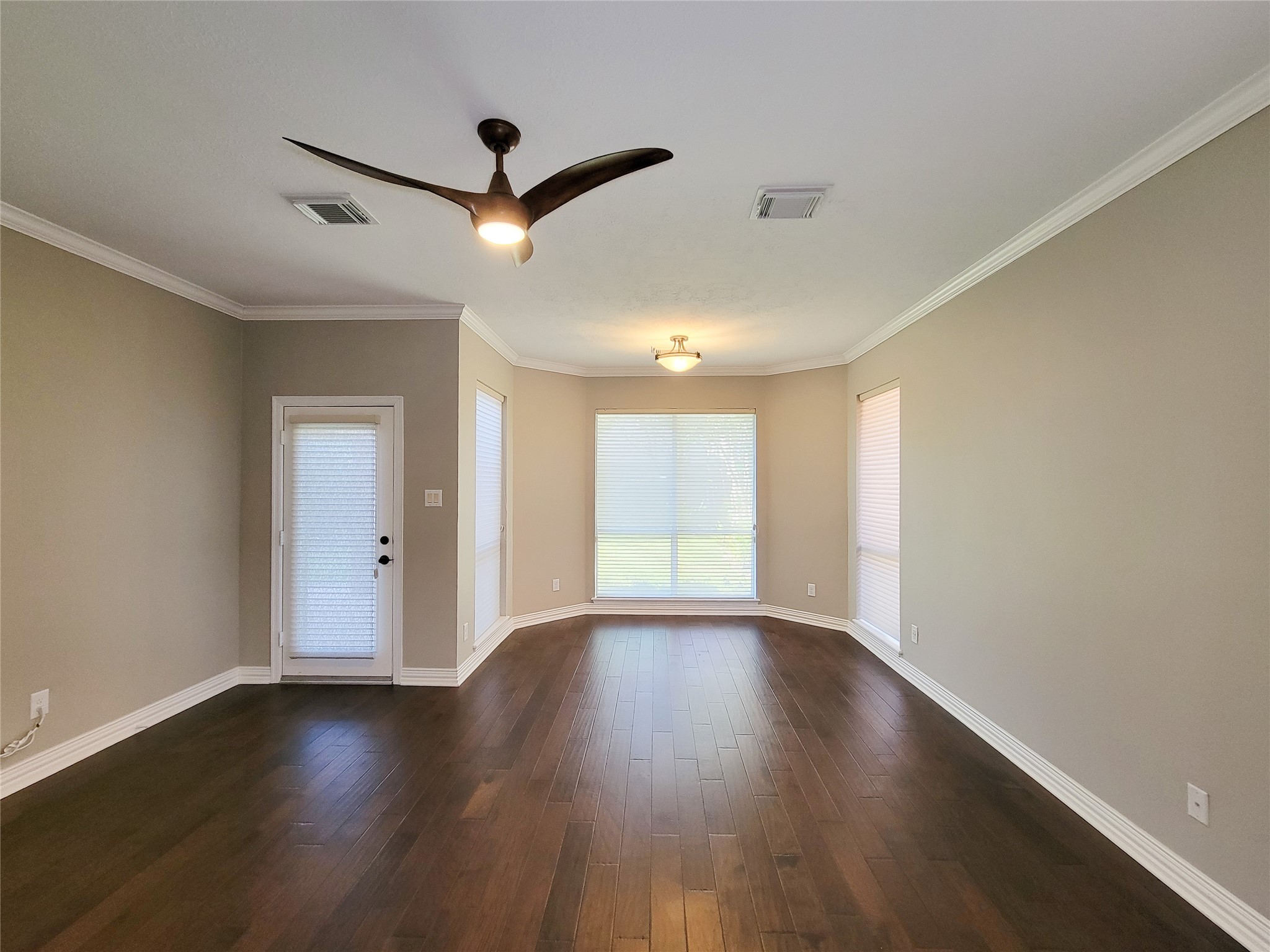 5507 Evening Shore Drive Houston, TX 77041 - Photo 24 of 50 a view of room window and wooden floor