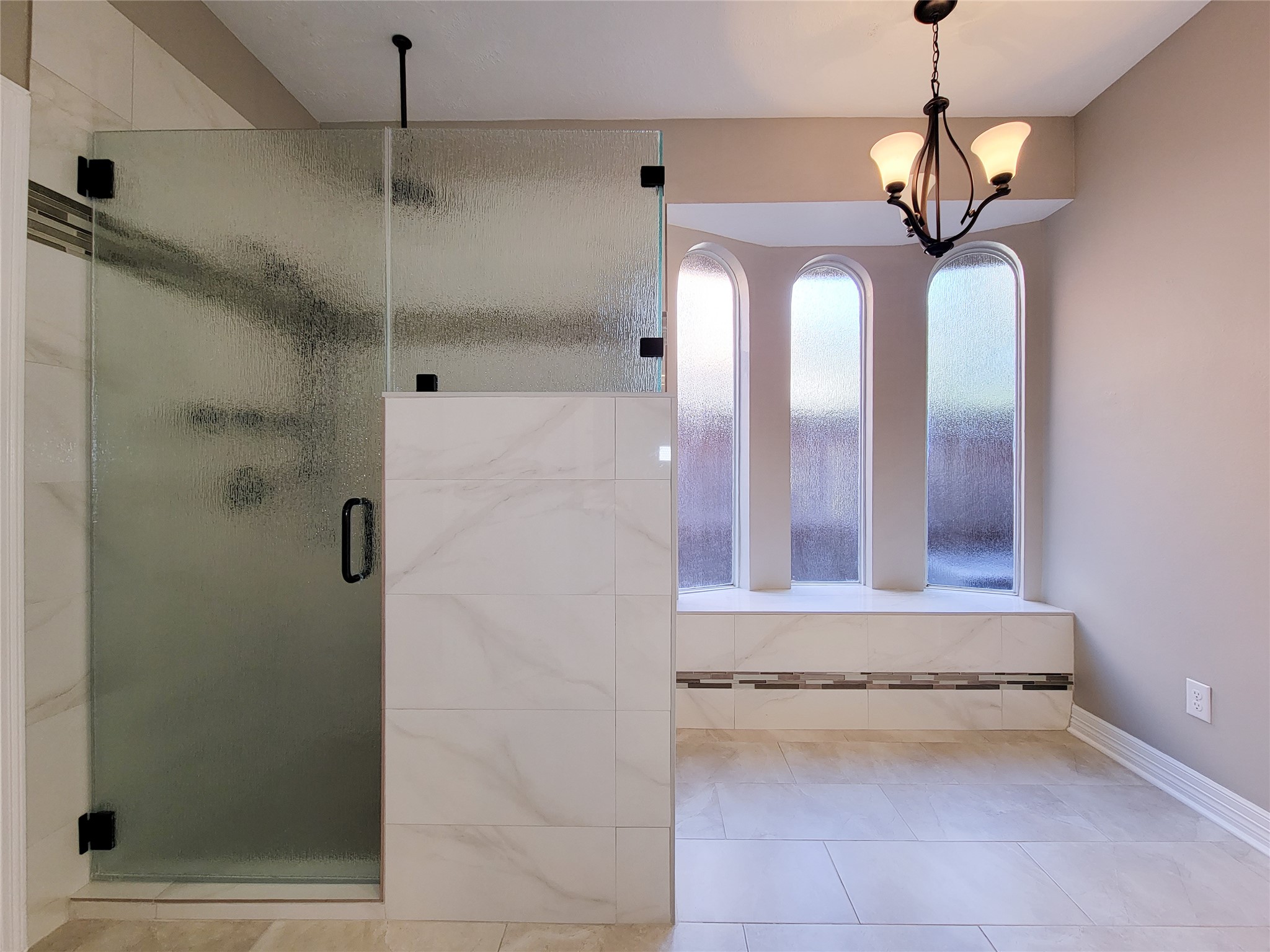 5507 Evening Shore Drive Houston, TX 77041 - Photo 28 of 50 a bathroom with a granite countertop shower a mirror and vanity