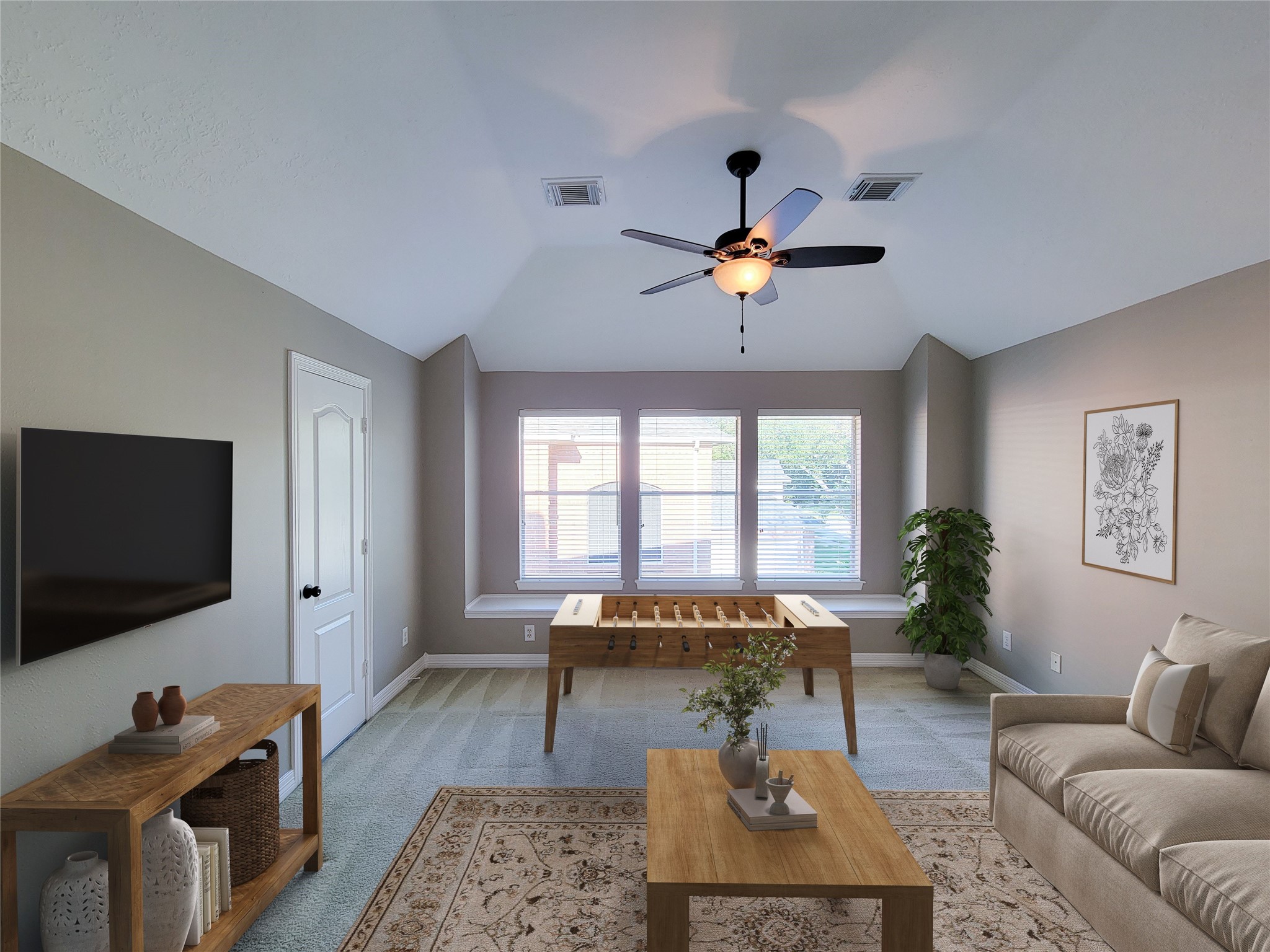 5507 Evening Shore Drive Houston, TX 77041 - Photo 35 of 50 a living room with furniture and a flat screen tv