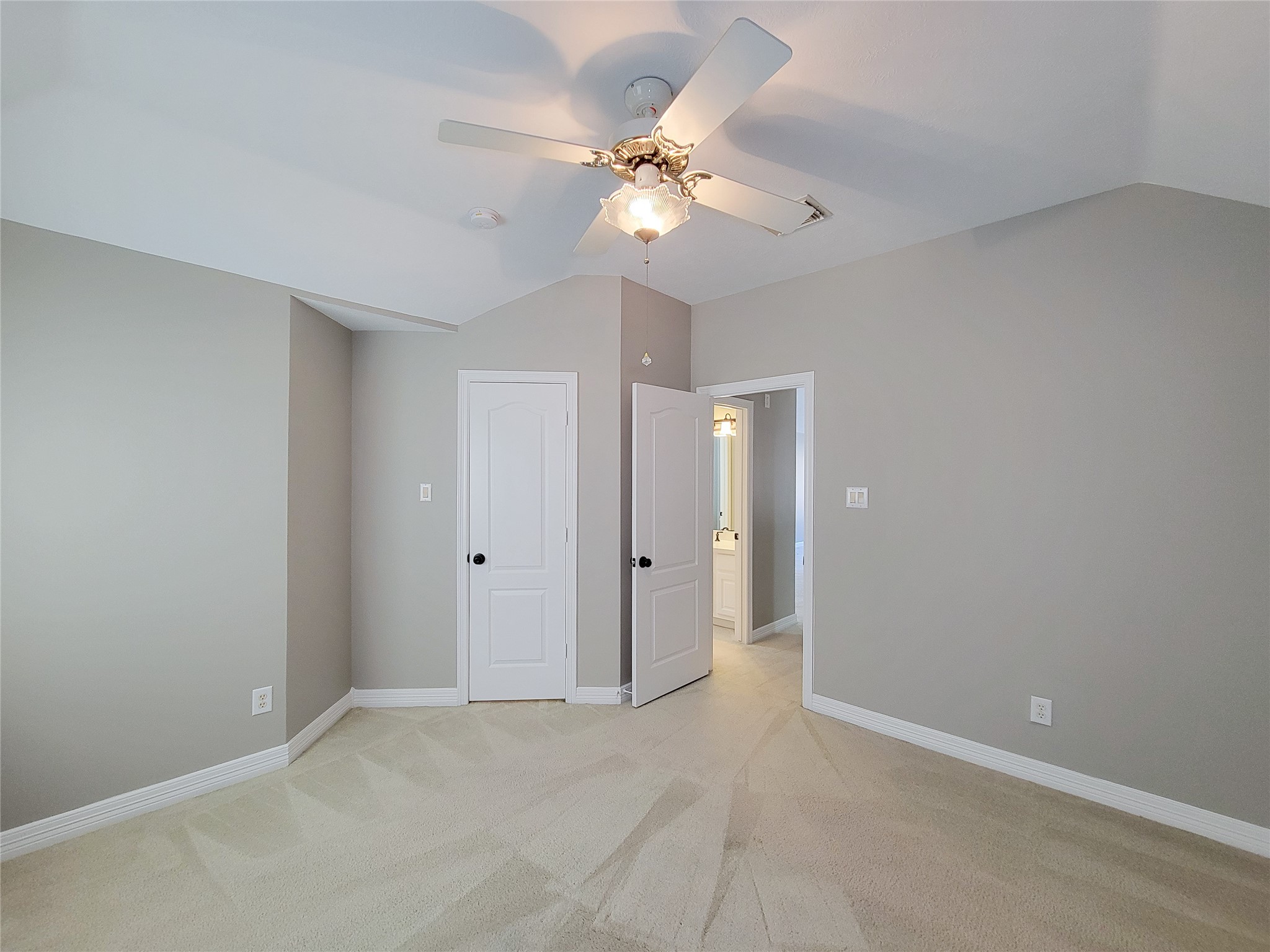 5507 Evening Shore Drive Houston, TX 77041 - Photo 40 of 50 wooden floor in an empty room with a chandelier fan