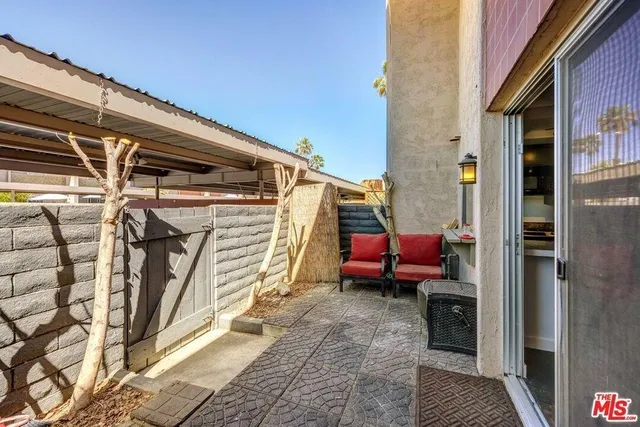 a view of car parked in front of a house