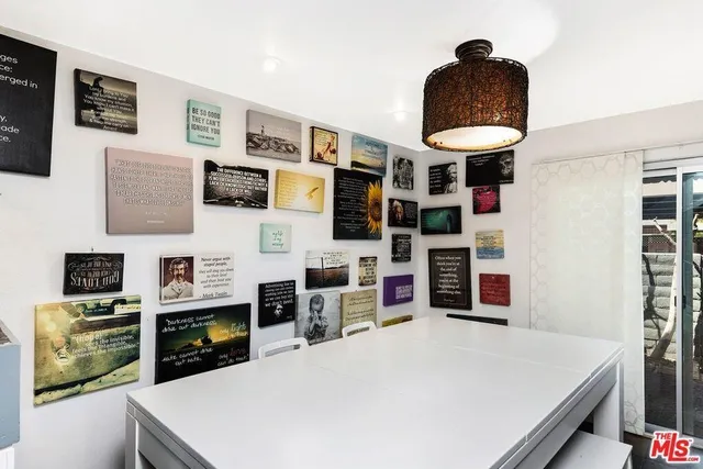 a kitchen with stainless steel appliances a stove a microwave and a counter top space