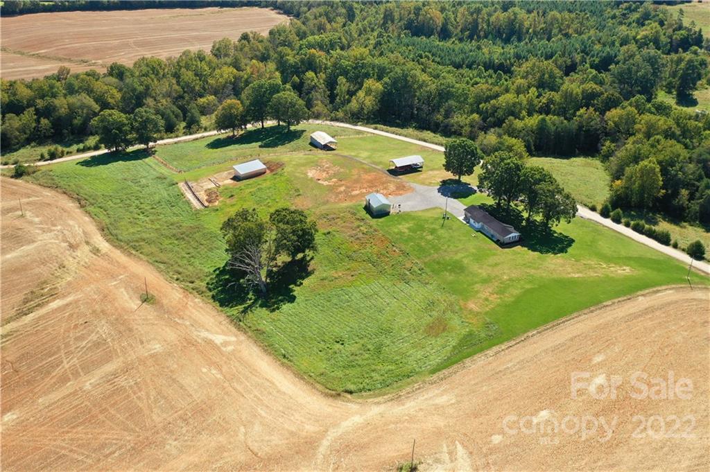 147 Stack Road Olin, NC 28660 - Photo 2 of 47 a view of a garden with an outdoor space