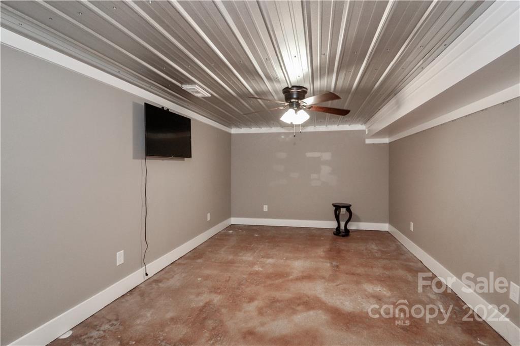 147 Stack Road Olin, NC 28660 - Photo 23 of 47 a view of a livingroom with a flat screen tv