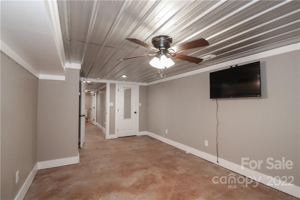 147 Stack Road Olin, NC 28660 - Photo 24 of 47 a view of a livingroom with a flat screen tv