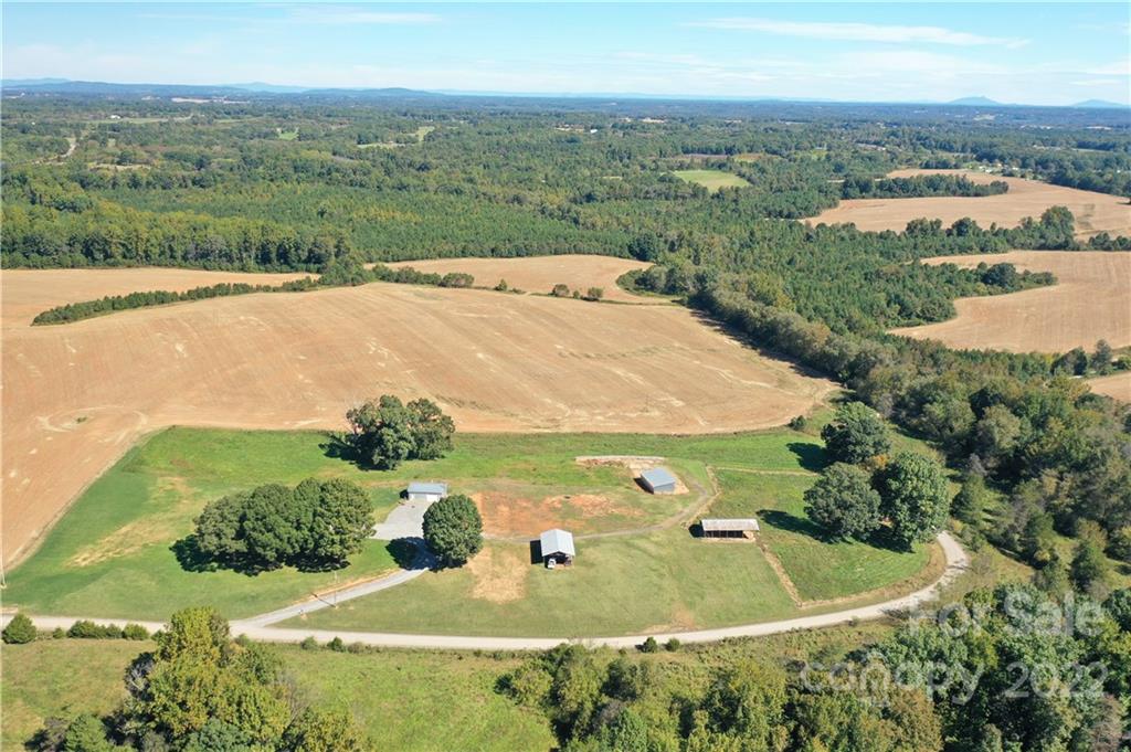 147 Stack Road Olin, NC 28660 - Photo 38 of 47 an aerial view of a house with yard