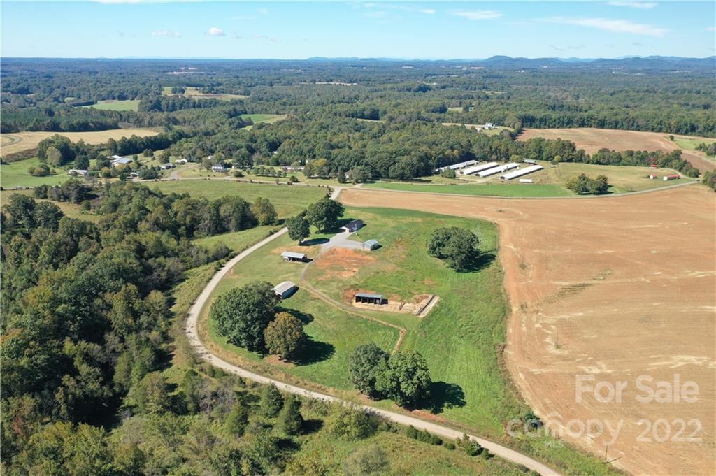 147 Stack Road Olin, NC 28660 - Photo 40 of 47 an aerial view of a house with a yard