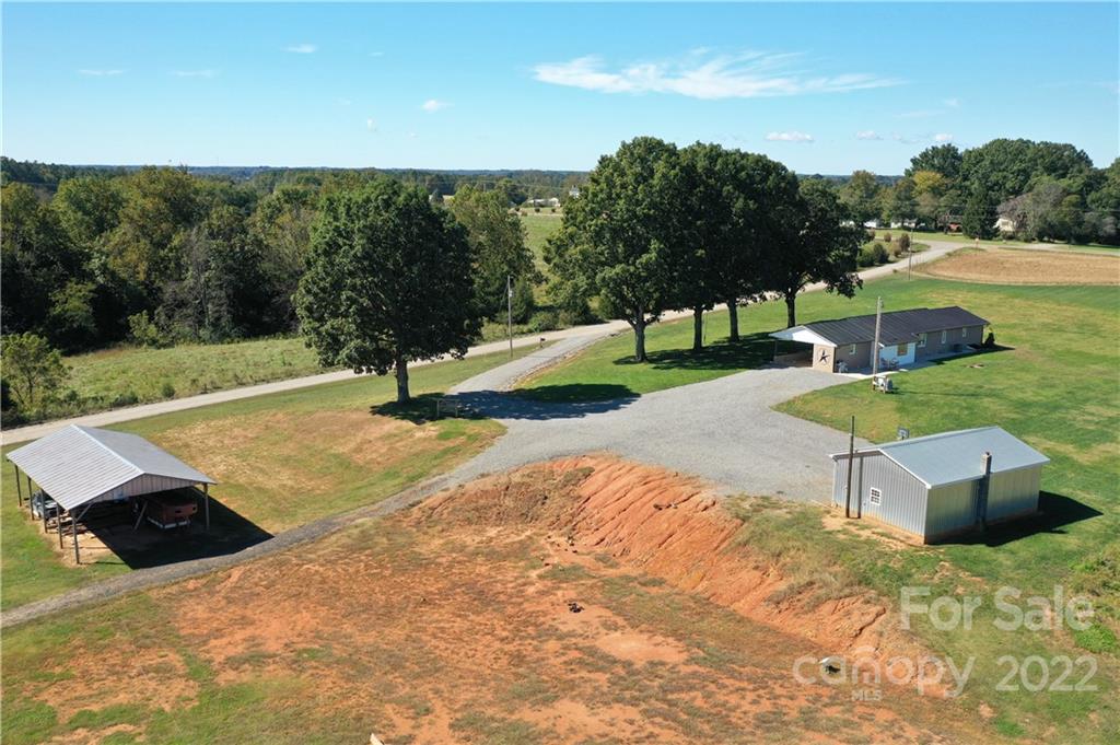 147 Stack Road Olin, NC 28660 - Photo 42 of 47 a view of a garden with an outdoor space