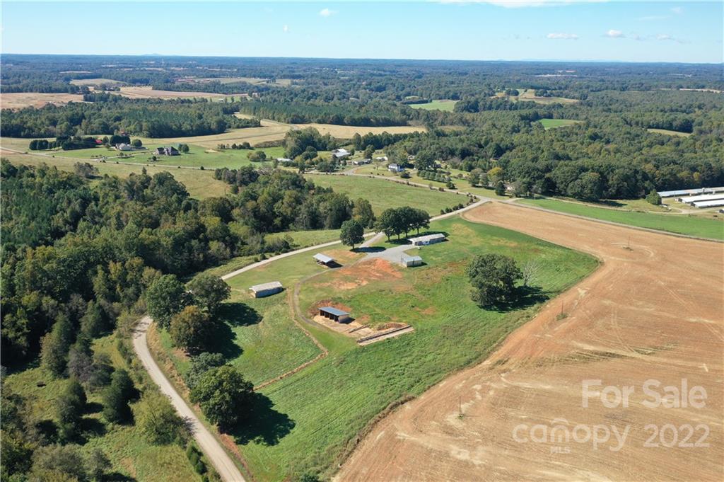 147 Stack Road Olin, NC 28660 - Photo 47 of 47 an aerial view of a house with yard