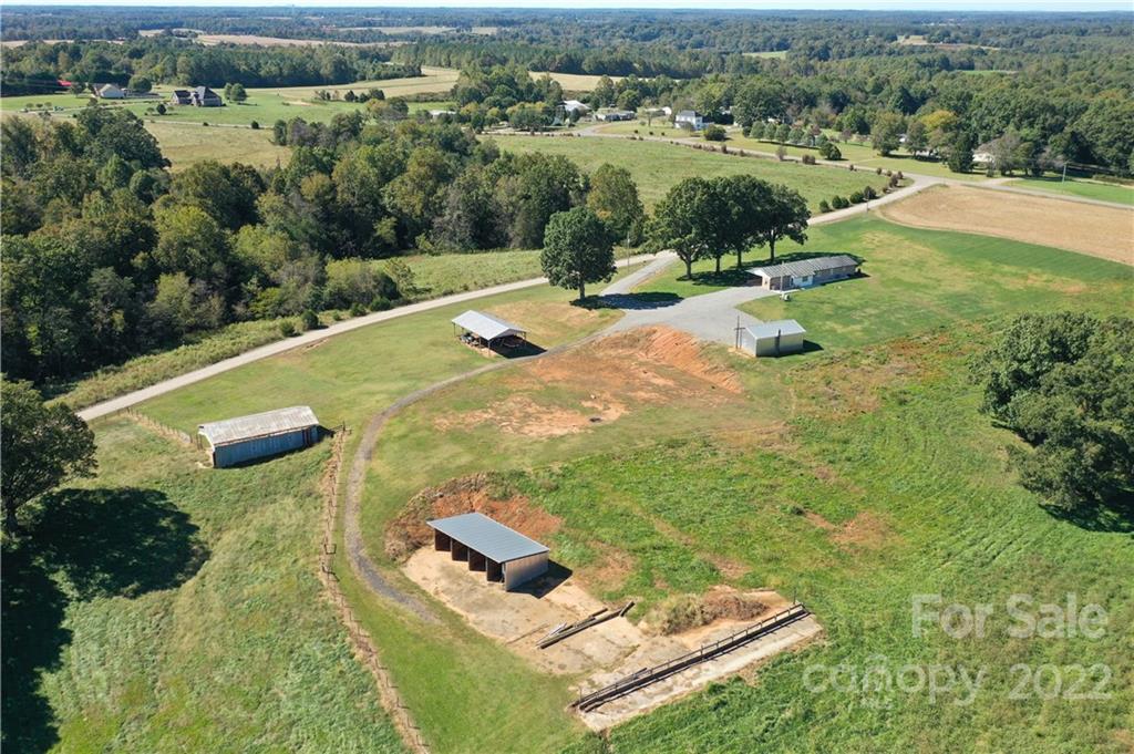147 Stack Road Olin, NC 28660 - Photo 6 of 47 an aerial view of a house with yard