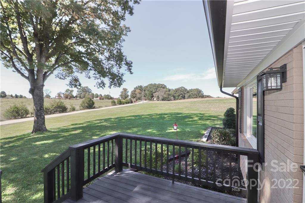 147 Stack Road Olin, NC 28660 - Photo 7 of 47 a view of deck and yard with seating space