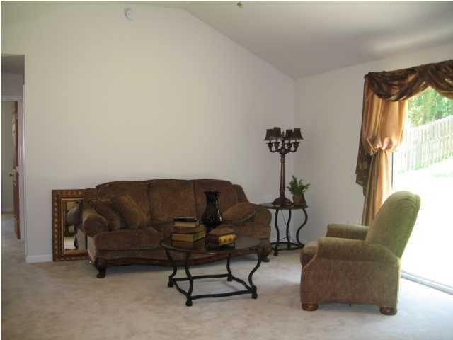 5214 Moore Loop Crestview, FL 32536 - Photo 2 of 13 a living room with furniture and a window