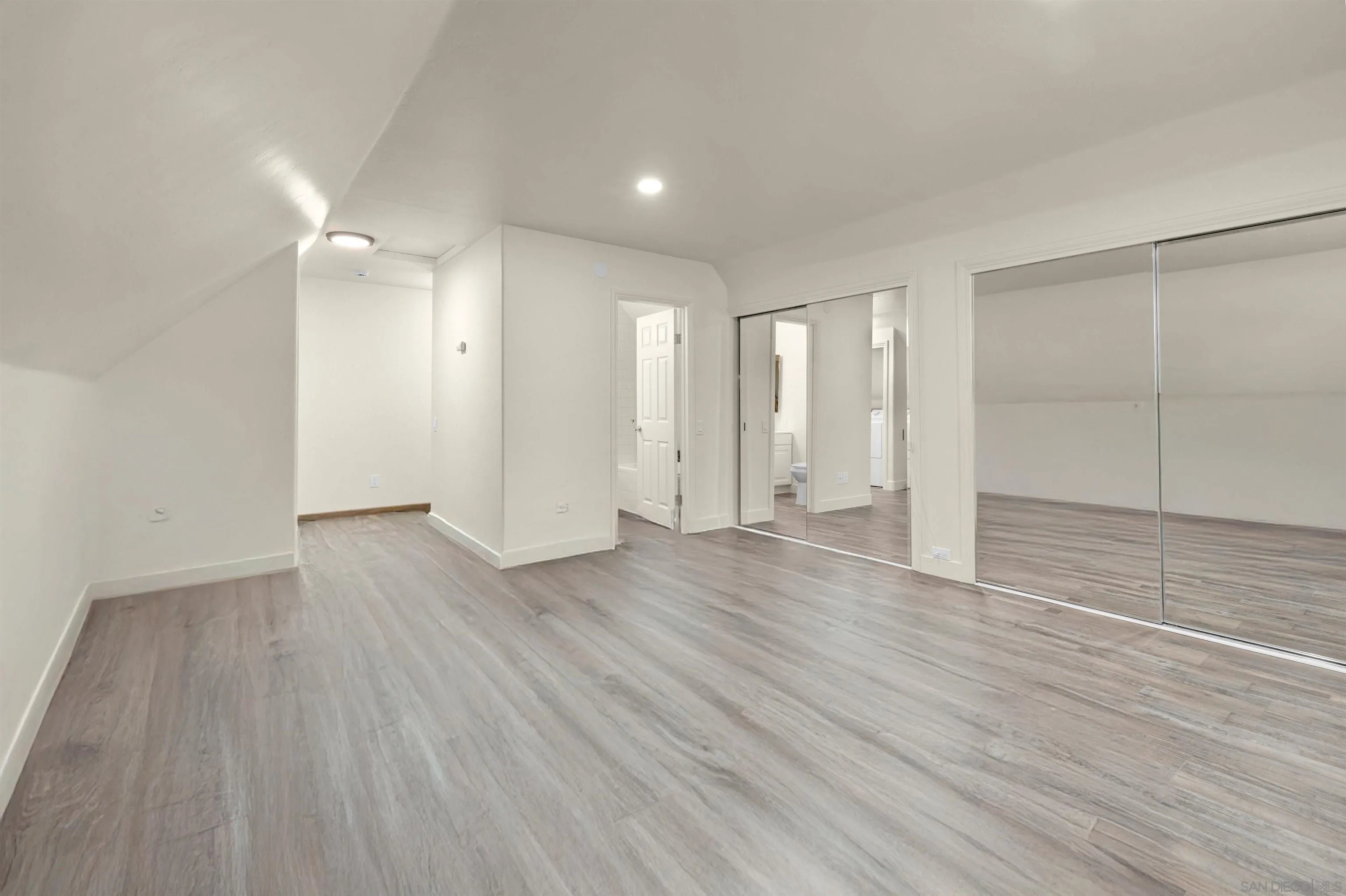 2015 2nd Street, Unit 2015 Julian, CA 92036 - Photo 9 of 11 a view of an empty room with wooden floor