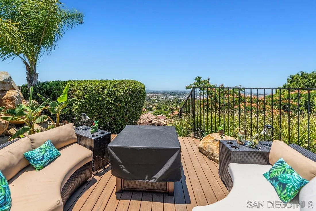 1778 Kings Road Vista, CA 92084 - Photo 14 of 49 a view of a balcony with two chairs and a table