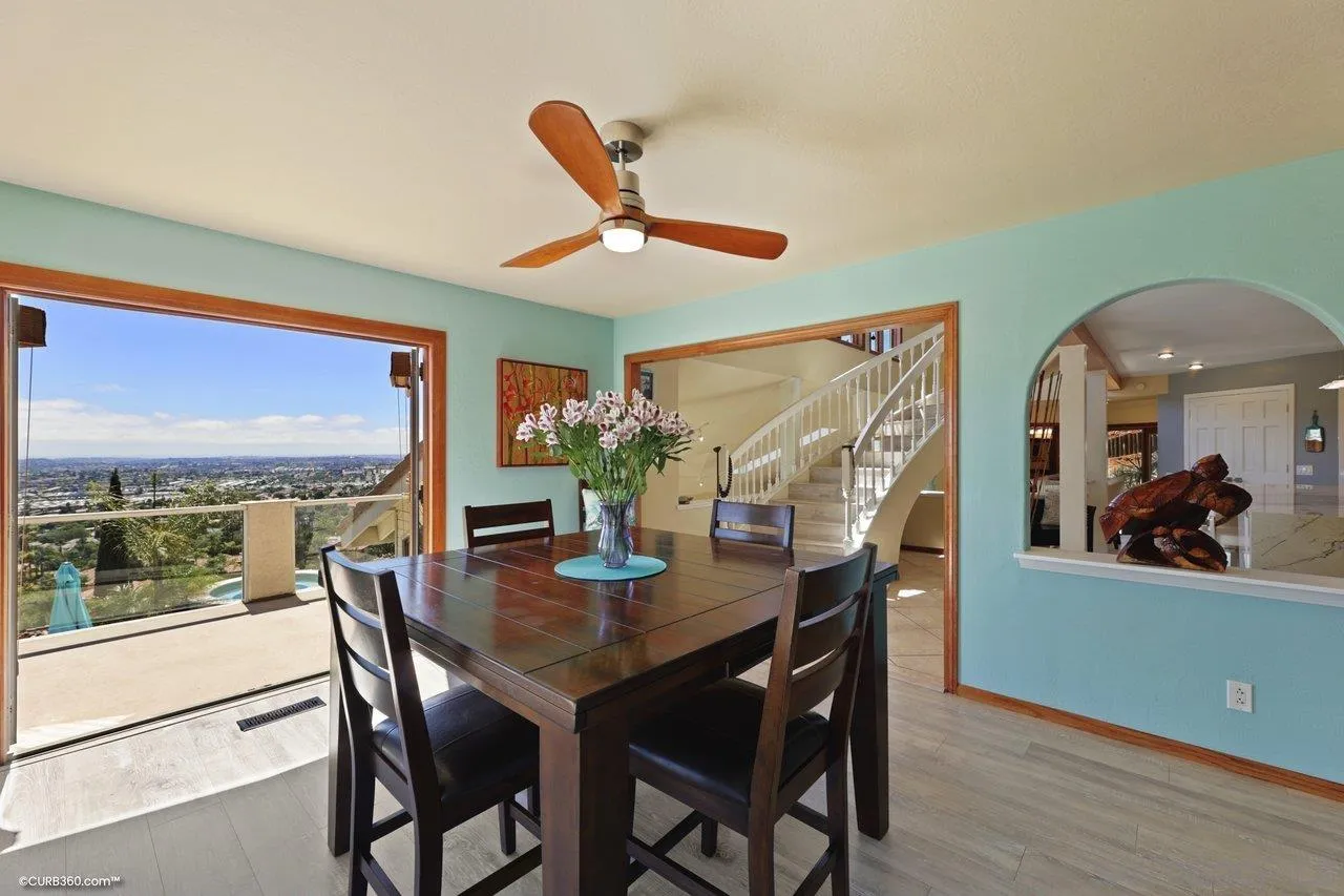 1778 Kings Road Vista, CA 92084 - Photo 23 of 49 a view of a dining room with furniture window and wooden floor