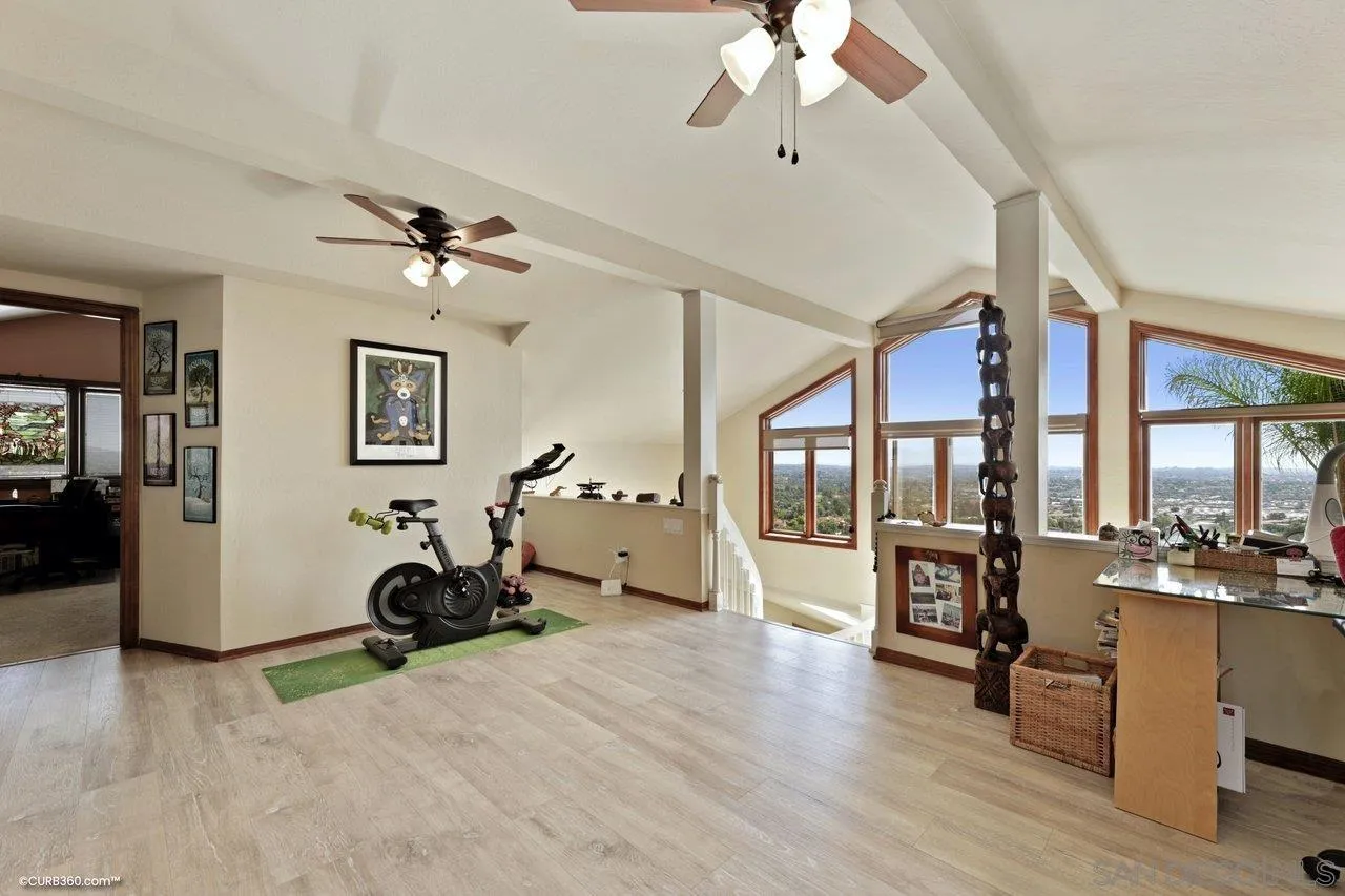 1778 Kings Road Vista, CA 92084 - Photo 42 of 49 a view of a livingroom with furniture and a ceiling fan