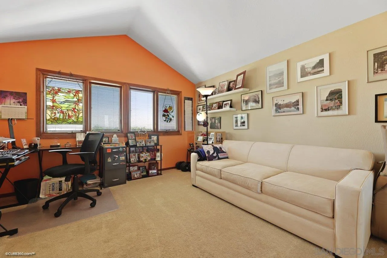 1778 Kings Road Vista, CA 92084 - Photo 43 of 49 a living room with furniture and a large window