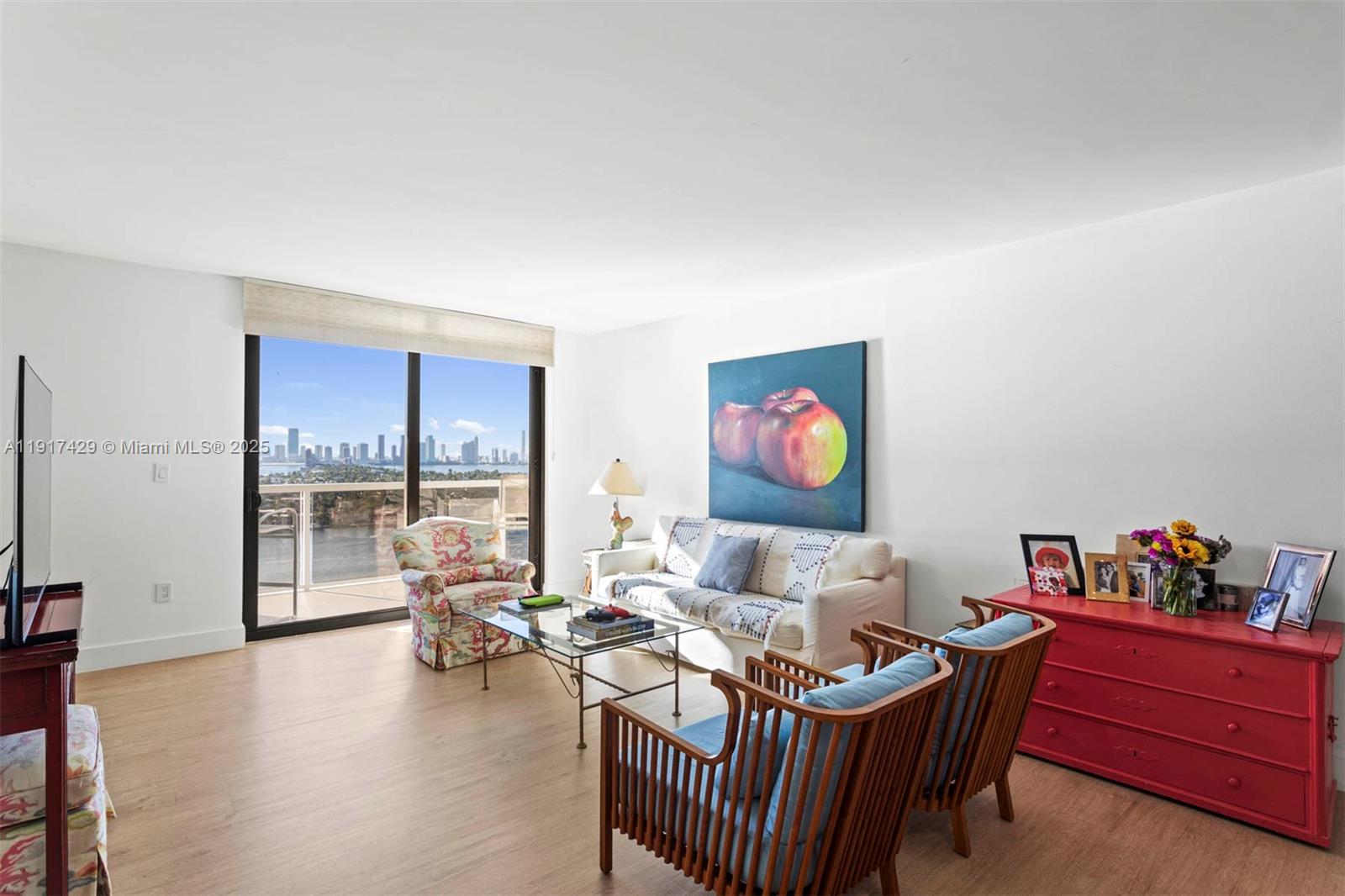9 Island Avenue, Unit 2006 Miami Beach, FL 33139 - Photo 4 of 24 a living room with furniture and floor to ceiling window