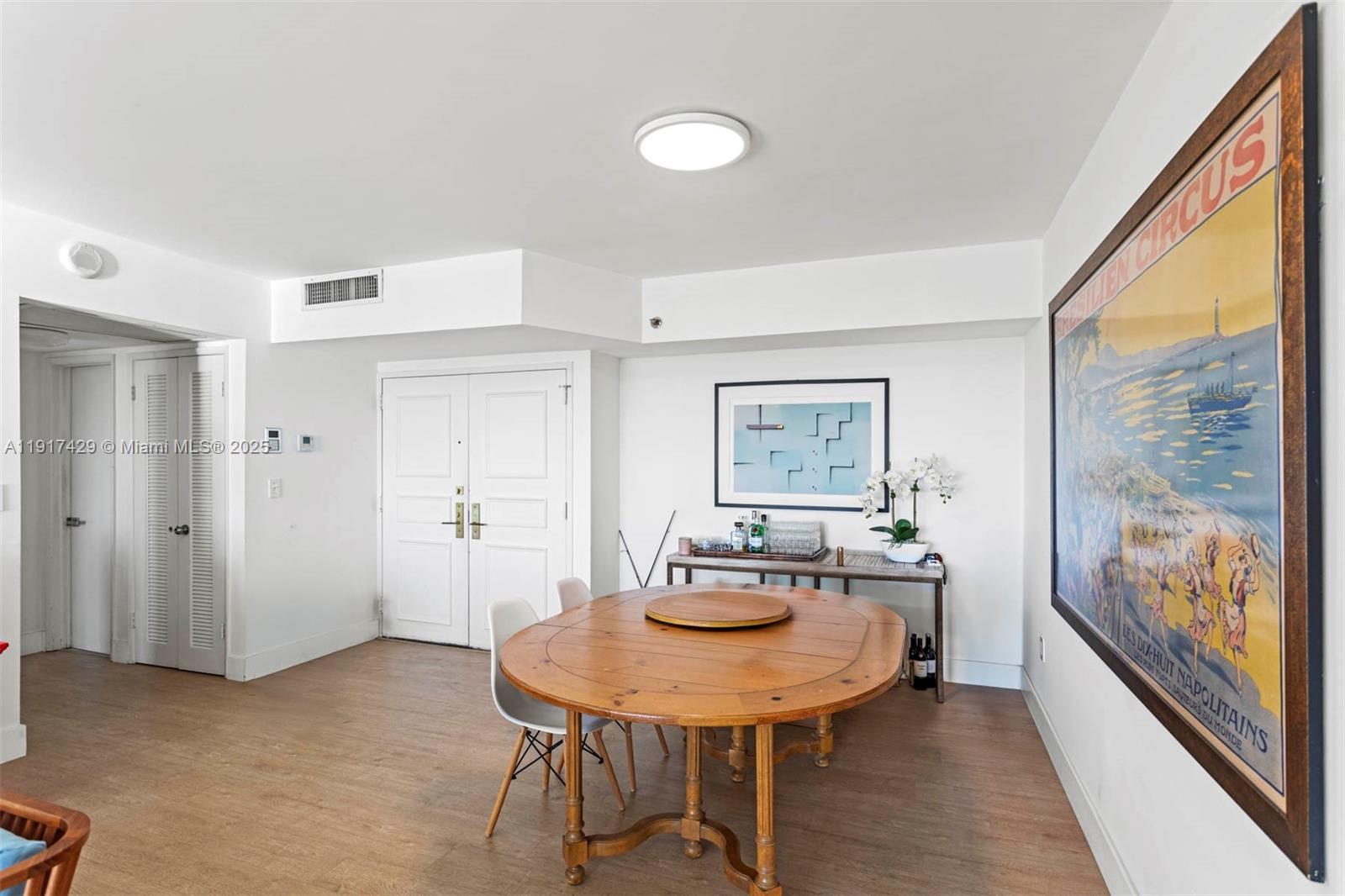 9 Island Avenue, Unit 2006 Miami Beach, FL 33139 - Photo 5 of 24 a view of a room with furniture and window