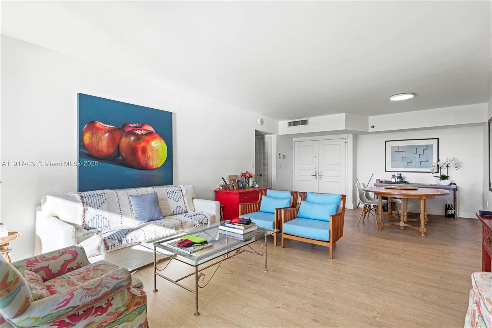 9 Island Avenue, Unit 2006 Miami Beach, FL 33139 - Photo 6 of 24 a living room with furniture and a flat screen tv