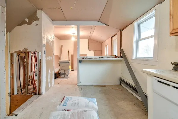 a bathroom with a toilet sink and vanity