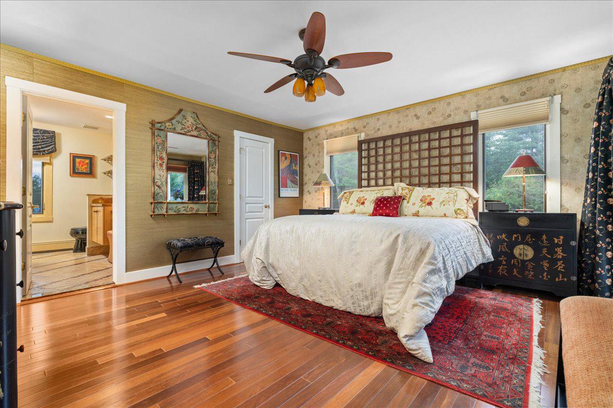 1121 Swamp Road Furlong, PA 18925 - Photo 21 of 50 Relaxing primary bedroom with warm accents.