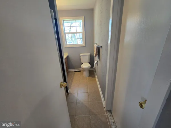 a walk in closet and window
