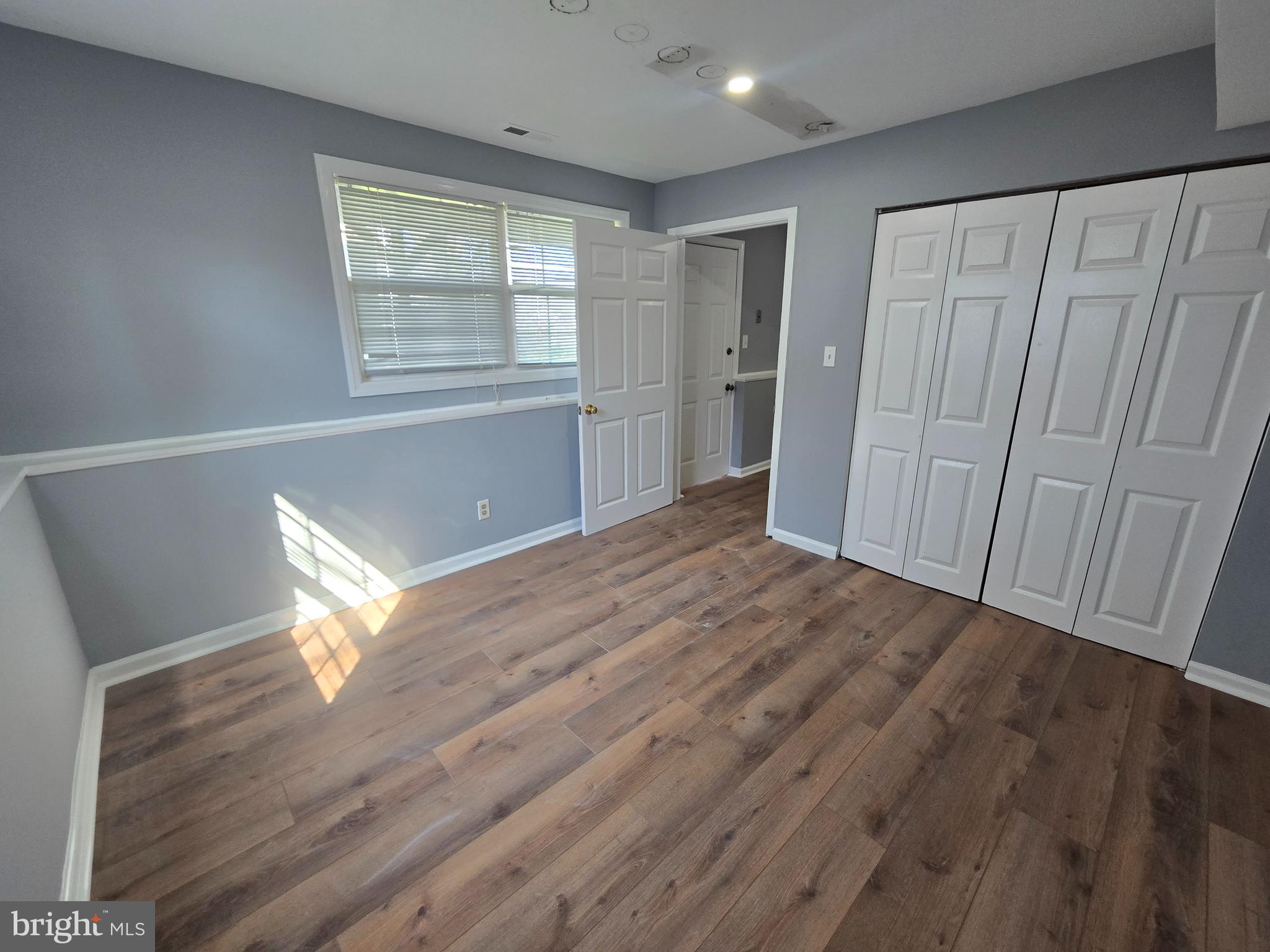 11 Hockamick Road Cookstown, NJ 08511 - Photo 21 of 45 a view of empty room with wooden floor and fan