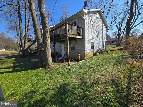 a house view with a outdoor space