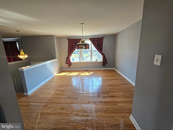 a view of a hallway with a window